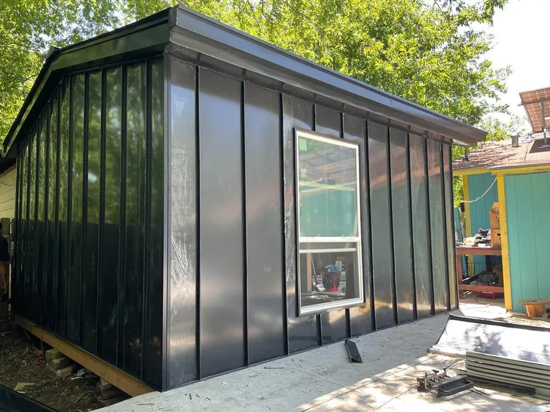 Black standing seam metal wall panels for Metal Roof Installation in Greenfield